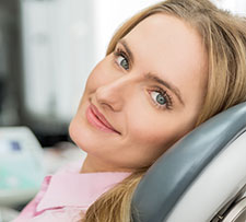 Woman sitting in a dental chair